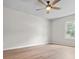 Bedroom with wood flooring, ceiling fan, and bright window at 107 Sugarpine Pl, Summerville, SC 29486