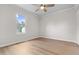 Bright bedroom featuring a ceiling fan, wood floors, and a window that provides natural light at 107 Sugarpine Pl, Summerville, SC 29486