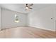Bedroom with wood flooring, a ceiling fan, and bright window at 107 Sugarpine Pl, Summerville, SC 29486