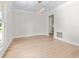 Bright dining room with wood flooring and modern light fixture at 107 Sugarpine Pl, Summerville, SC 29486