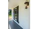 Exterior view featuring the home's window, lantern, and black shutters at 107 Sugarpine Pl, Summerville, SC 29486