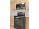 Close up of the black stainless steel oven at 107 Sugarpine Pl, Summerville, SC 29486