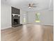 Spacious living room with a stone fireplace and hardwood floors at 107 Sugarpine Pl, Summerville, SC 29486