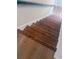 Beautiful wooden stairs with a sleek railing, connecting different levels of the home at 107 Sugarpine Pl, Summerville, SC 29486