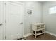 Entryway featuring a coat rack with hanging keys and a small white storage bench at 109 Goose Rd, Summerville, SC 29483