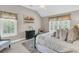 A bedroom features neutral tones, plantation shutters, and natural light for ultimate relaxation at 1100 Griswold St, Mount Pleasant, SC 29466