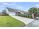 Charming home with a spacious driveway, attached garage, and well-manicured landscaping, blending comfort and curb appeal at 1100 Griswold St, Mount Pleasant, SC 29466