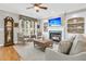 Bright living room with a fireplace, hardwood floors, and a neutral color palette at 1100 Griswold St, Mount Pleasant, SC 29466