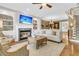 Comfortable living room with a fireplace, built-in shelving, and a flat-screen television at 1100 Griswold St, Mount Pleasant, SC 29466