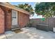 Backyard patio with a white door and a turtle decoration on the fence at 1126 Brigantine Dr, Charleston, SC 29412