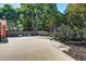 Long driveway with an outdoor swing set and landscaping at 1126 Brigantine Dr, Charleston, SC 29412