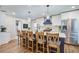 Bright kitchen with a large island, stainless steel appliances, and ample counter space for meal preparation at 1126 Brigantine Dr, Charleston, SC 29412