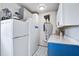 Efficient pantry with extra refrigerators, storage cabinets, and ample counter space for food preparation at 1126 Brigantine Dr, Charleston, SC 29412