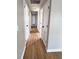 Hallway with pristine hardwood flooring and freshly painted neutral walls at 114 Madison St, Walterboro, SC 29488