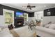 Inviting living room with a striking fireplace, modern furnishings, and an open layout perfect for entertaining at 1260 Old Whitesville Rd, Moncks Corner, SC 29461
