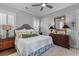 Serene bedroom with a large bed, comfortable linens, and ample natural light at 129 Martins Point Dr, Wando, SC 29492