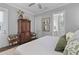 Bright bedroom with ensuite bathroom, wooden accents, and a soothing color scheme at 129 Martins Point Dr, Wando, SC 29492