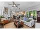 Open-concept living space with modern decor, hardwood floors, and seamless flow to the kitchen at 129 Martins Point Dr, Wando, SC 29492