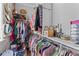 Organized walk-in closet with shelves, hanging racks, and a variety of clothing at 129 Martins Point Dr, Wando, SC 29492