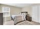 Cozy bedroom with natural light, neutral tones, plush carpeting, and ample closet space for comfortable living at 153 Instructor Ct, Ladson, SC 29456
