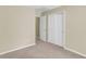 Neutral-toned bedroom with generous closet space and easy access to other areas, providing versatile living at 153 Instructor Ct, Ladson, SC 29456