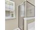 Bathroom shower stall with framed glass door and natural light from window at 153 Instructor Ct, Ladson, SC 29456