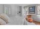 Comfortable bedroom filled with natural light, featuring white walls and hardwood floors at 176 Smith St, Charleston, SC 29403