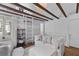 Unique loft space with exposed beams, comfortable seating, and natural light at 176 Smith St, Charleston, SC 29403