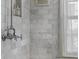 Detailed shot of marble shower with window at 176 Smith St, Charleston, SC 29403
