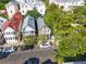 Charming street view with parked cars highlighting the architecture and tree-lined streets at 176 Smith St, Charleston, SC 29403