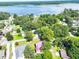 Picturesque aerial view of a charming residential area with tree-lined streets and stunning lake views at 1804 Bass Rd, Moncks Corner, SC 29461