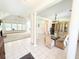 Bright dining room with tile floors, chandelier, and easy access to the living room at 1804 Bass Rd, Moncks Corner, SC 29461