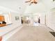 Expansive living area with open floor plan, bright lighting, and access to the dining and kitchen spaces at 1804 Bass Rd, Moncks Corner, SC 29461