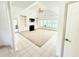 Open-concept living room featuring built-in shelving, a fireplace, and multiple windows at 1804 Bass Rd, Moncks Corner, SC 29461