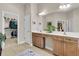 Bathroom featuring double sinks, vanity, and a walk-in closet with ample storage at 1809 Two Cedar Way, Mount Pleasant, SC 29466