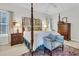 Bedroom featuring a four-poster bed, carpeted floors, and neutral walls at 1809 Two Cedar Way, Mount Pleasant, SC 29466