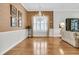 Formal dining room featuring hardwood floors, a decorative chandelier, and elegant wall accents at 1809 Two Cedar Way, Mount Pleasant, SC 29466
