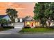 Inviting home with a well-kept lawn, a cozy front porch, and an attached two-car garage at 1809 Two Cedar Way, Mount Pleasant, SC 29466