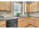 Well-maintained kitchen area with tile backsplash and neutral cabinetry at 1809 Two Cedar Way, Mount Pleasant, SC 29466