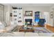 Cozy living room featuring a fireplace, built-in bookcase, and stylish furnishings at 1809 Two Cedar Way, Mount Pleasant, SC 29466