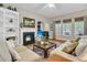 Inviting living room with a fireplace, built-in shelving, and comfortable seating at 1809 Two Cedar Way, Mount Pleasant, SC 29466