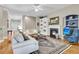 Spacious living room boasts hardwood floors, a fireplace, and an open layout at 1809 Two Cedar Way, Mount Pleasant, SC 29466