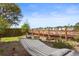 Secluded backyard featuring a hammock and shaded seating area, ideal for relaxation and leisure at 1821 Towne St, Johns Island, SC 29455