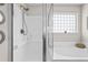 Clean, modern bathroom featuring a glass shower enclosure and separate soaking tub at 1821 Towne St, Johns Island, SC 29455