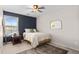Comfortable bedroom featuring a bed, nightstand, area rug, and natural lighting at 1821 Towne St, Johns Island, SC 29455
