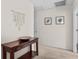 Welcoming hallway with elegant console table and tasteful botanical wall art at 1821 Towne St, Johns Island, SC 29455