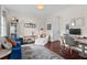 Cozy living room featuring stylish furniture, natural light, and hardwood flooring for a comfortable atmosphere at 1821 Towne St, Johns Island, SC 29455