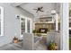 Charming covered patio with outdoor seating and a relaxing porch swing at 1821 Towne St, Johns Island, SC 29455