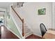 Staircase featuring carpeted steps and a natural wood banister at 1821 Towne St, Johns Island, SC 29455