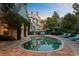 Charming backyard oasis with a sparkling pool, perfect for relaxation and elegant outdoor gatherings at 208 Sumter Ave, Summerville, SC 29483